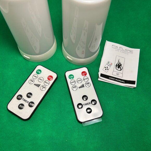 FIA Flame Candles. Set of 2, have 2 remotes and 1 box. Charging cables included. - Picture 5 of 6